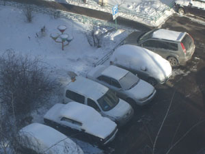 Уборка автостоянок от снега