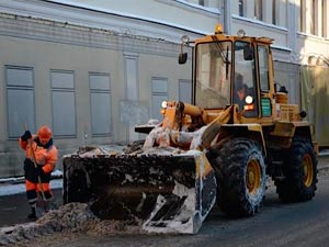 уборка снега трактором